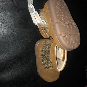 Carter’s tan and gold boots